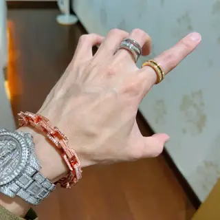 Bvlgari Wide hollow ring with diamonds