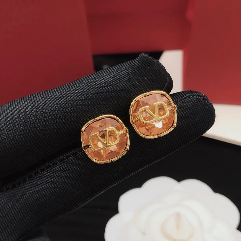 Valentino earrings with red square diamonds