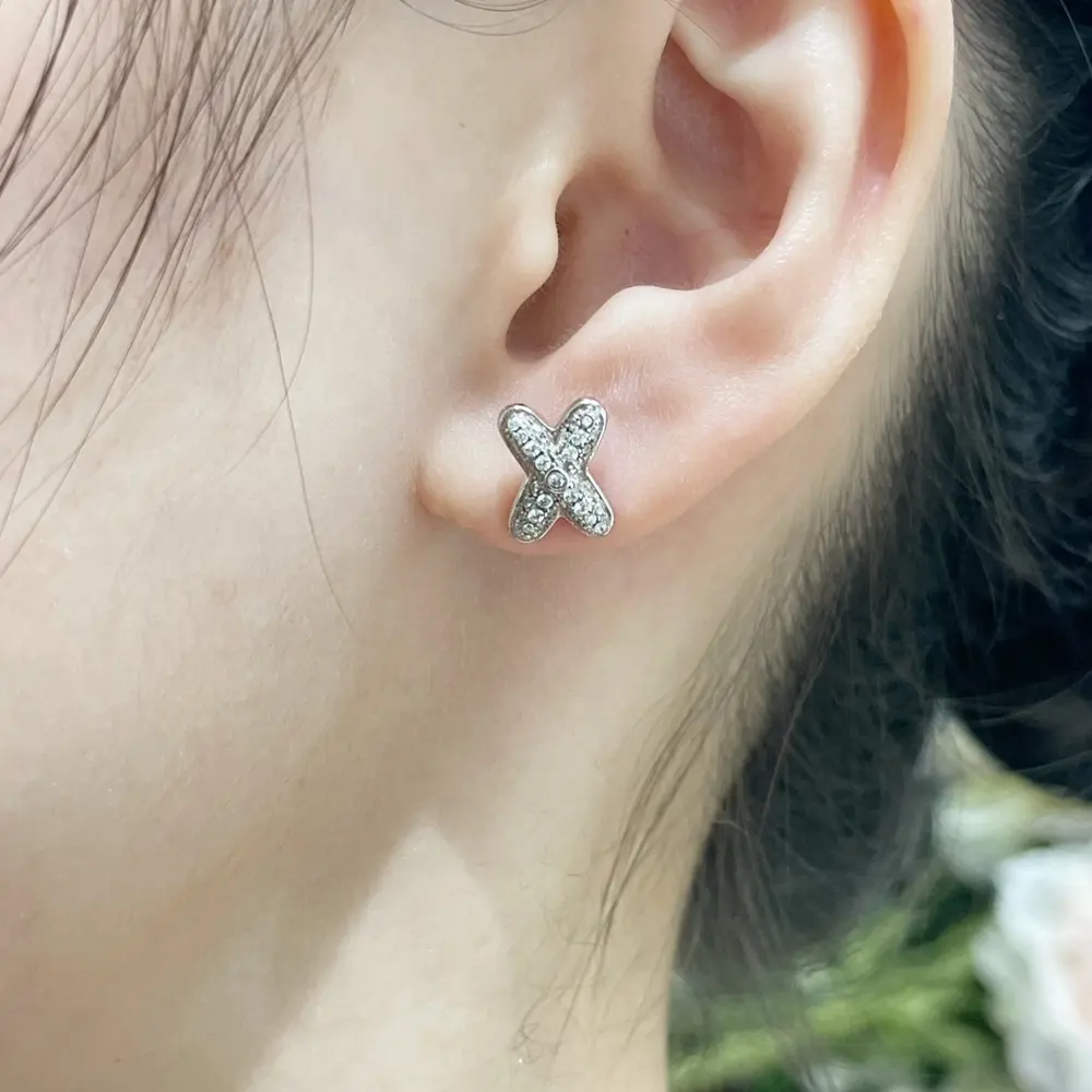 Chaumet cross-over diamond earrings