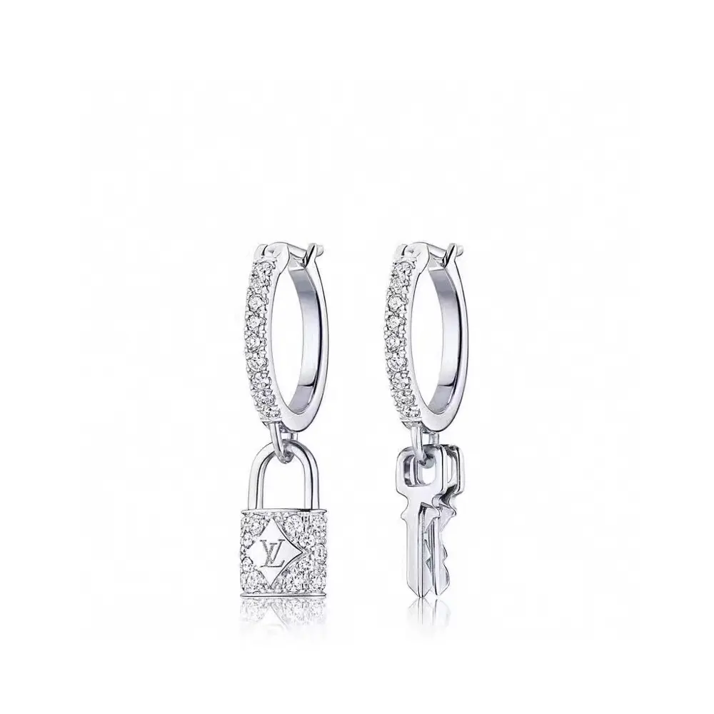 Louis Vuitton padlock key earrings