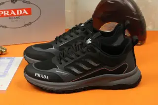 Prada Italian men’s shoes are featured on the cover of the quarterly fashion magazine