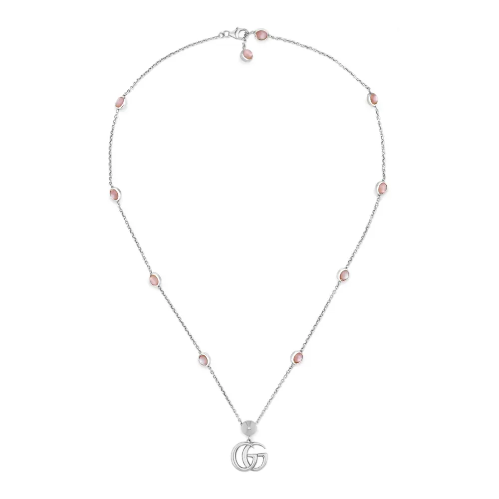 Gucci necklace This double G necklace features a unique flower pendant at the clasp. The