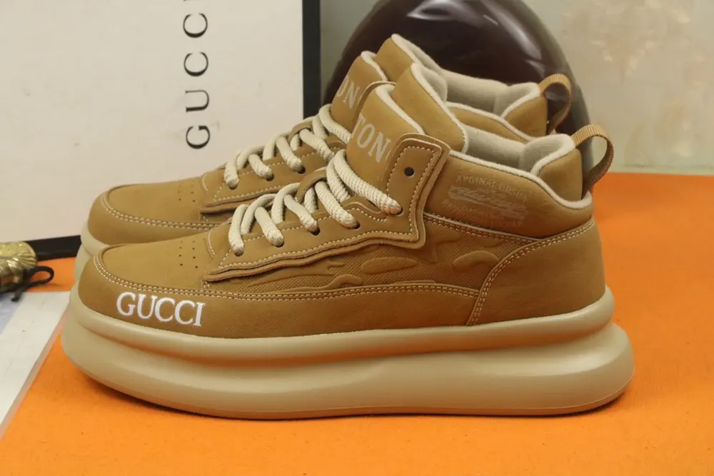 Gucci high-top casual shoes are featured on the cover of Italian men’s fashion magazines