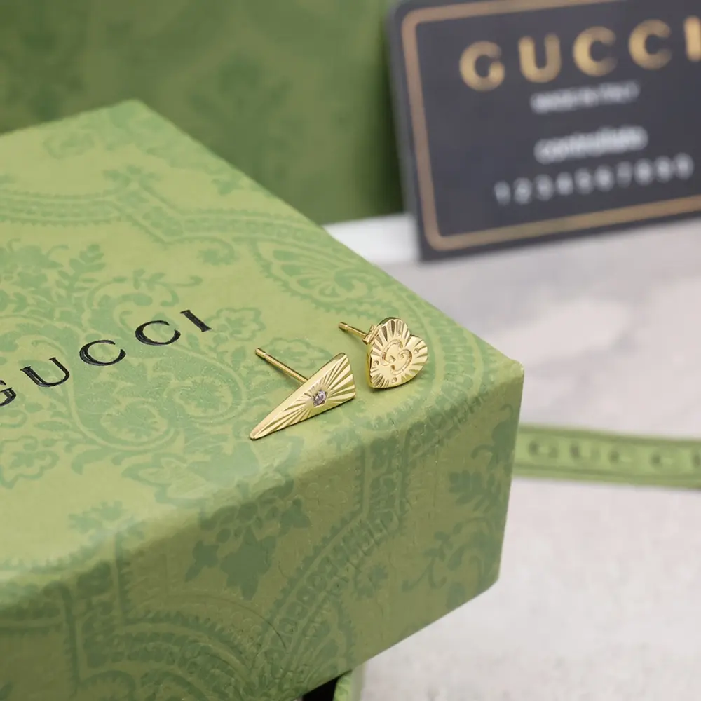 GUCCI stud earrings gold asymmetric icon diamond