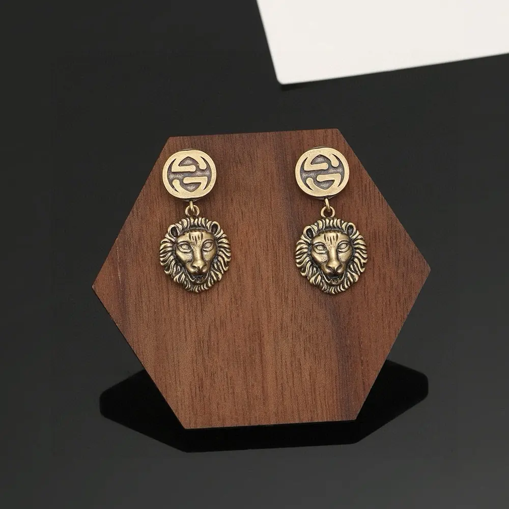 Gucci lion head earrings