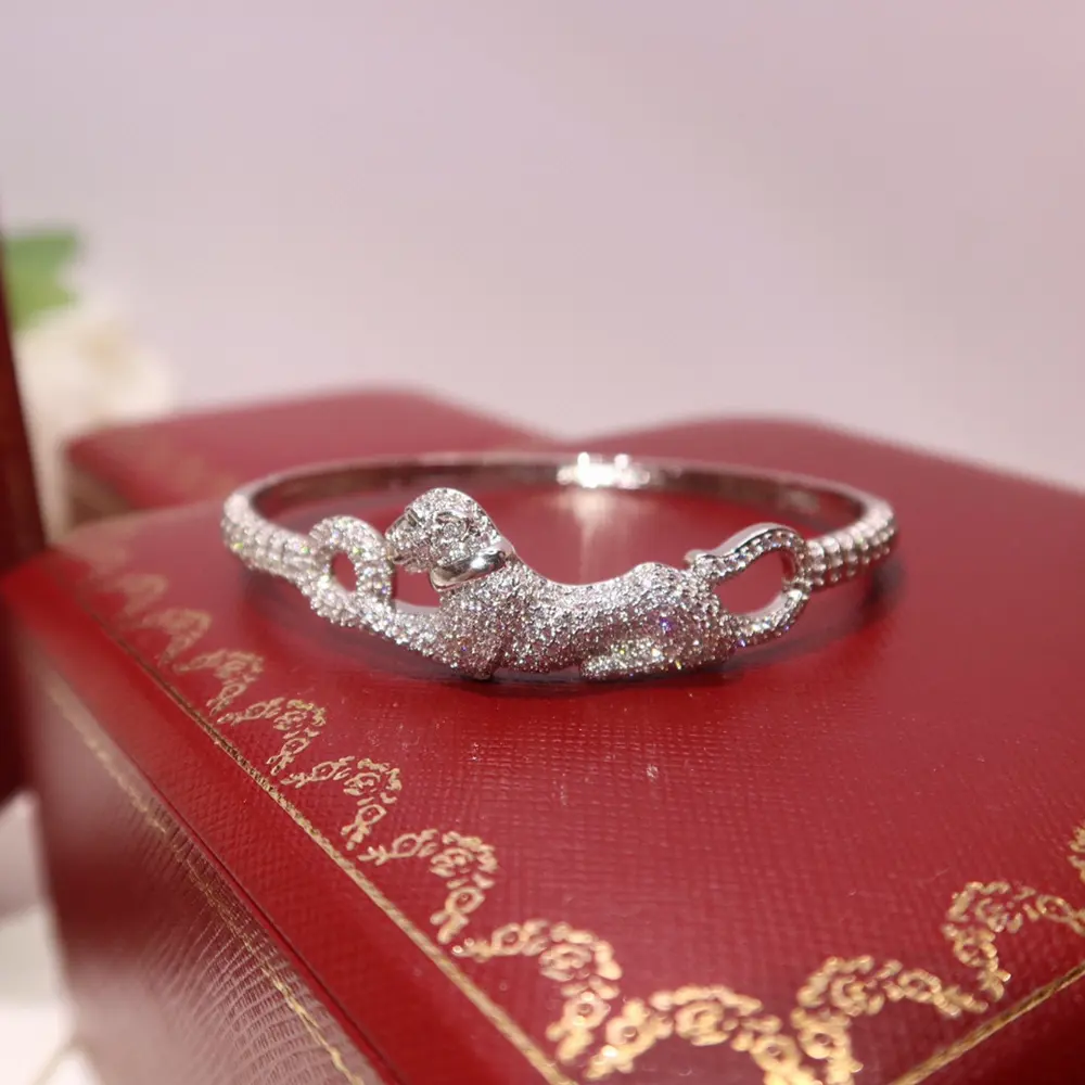Cartier’s domineering panther bracelet with diamonds. Panthère de Cartier panther bracelet