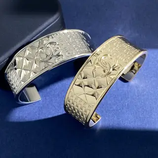Chanel metal logo engraved wide C-shaped bracelet