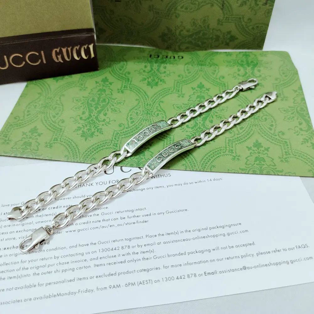 GUcci logo and light green grey enamel coating details. Light and bright tones complement