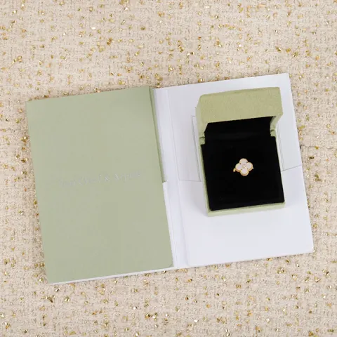 Van Cleef & Arpels four-leaf clover ring with diamonds