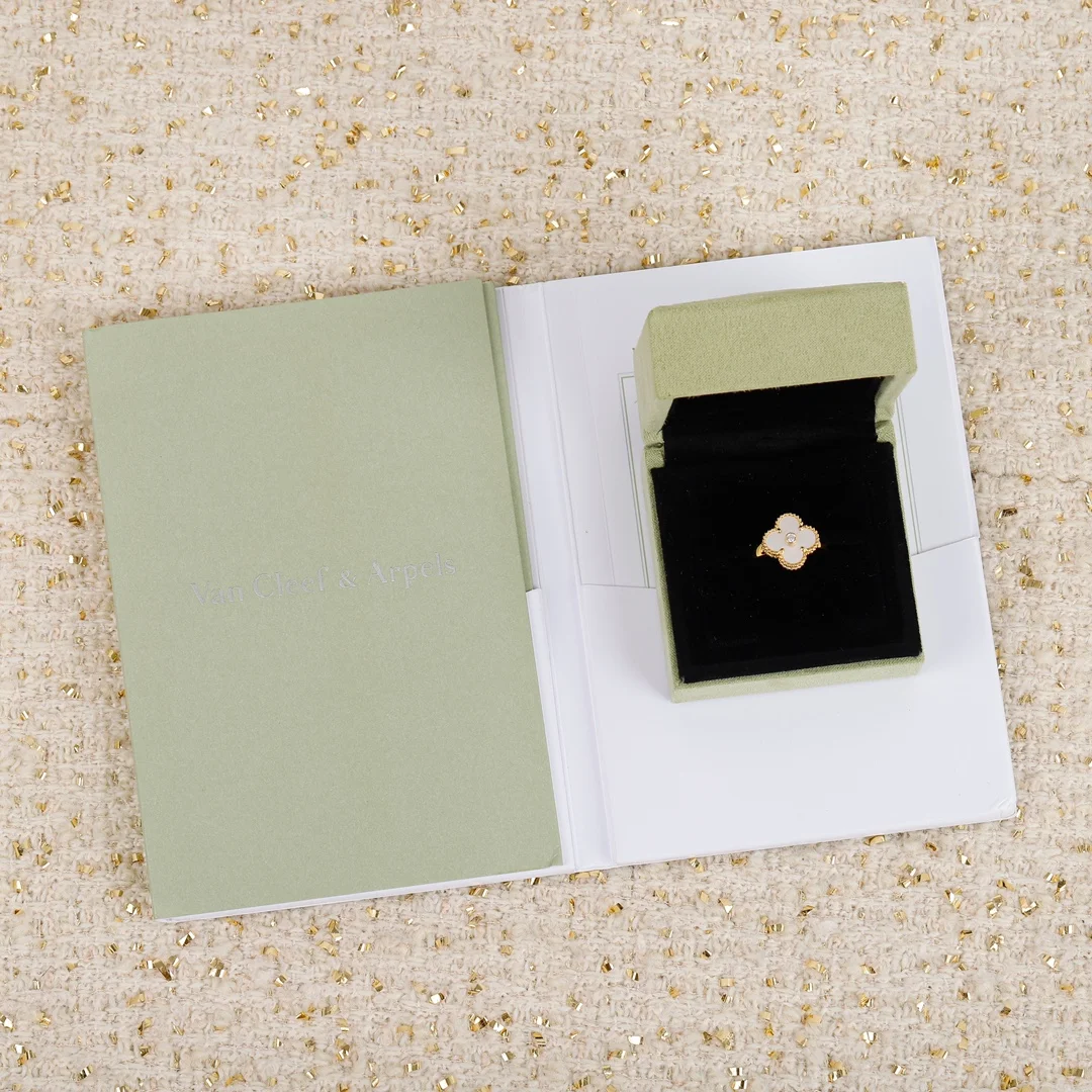 Van Cleef & Arpels four-leaf clover ring with diamonds