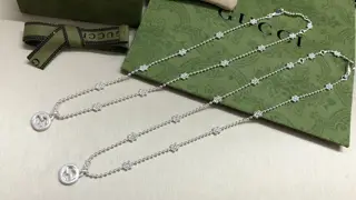 Gucci Lntelocking G pendant