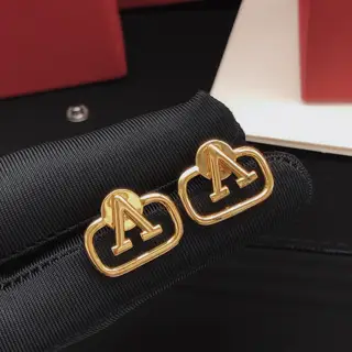 Valentino earrings V-shaped glossy