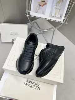 Alexander McQueen Sprint sports couple style. The side of the shoe is decorated with a