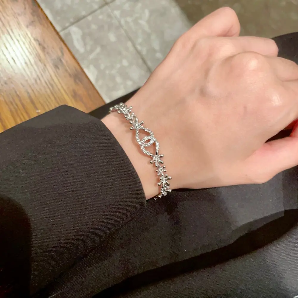 Chanel Camellia Double C Diamond Bracelet