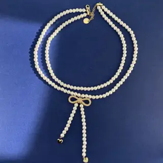Chanel scented fashion bow inlaid with small pearls double-layer pearl chain necklace