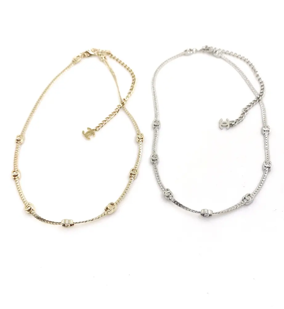 Chanel white gold 9 flower cc necklace