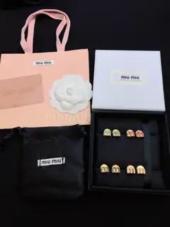miumiu letter m earrings