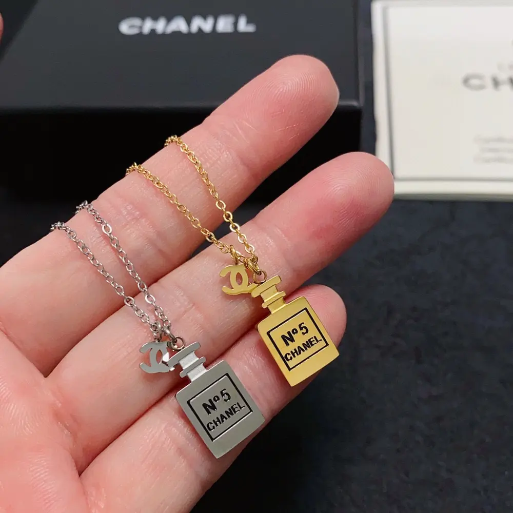 Chanel Double C perfume bottle necklace