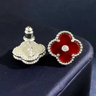 Van Cleef & Arpels Raised Dot Single Diamond Four-Leaf Clover Earrings