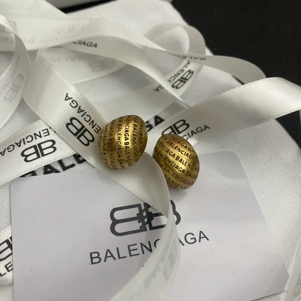 Balenciaga gold bean letter earrings