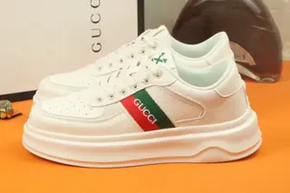Gucci thick-soled platform shoes are featured on the cover of Italian men’s shoes fashion