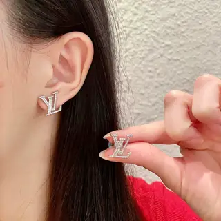 Louis Vuitton vintage LV letter earrings