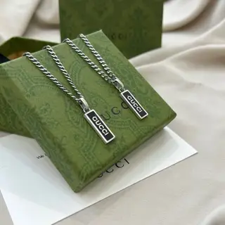 Gucci black enamel pendant necklace