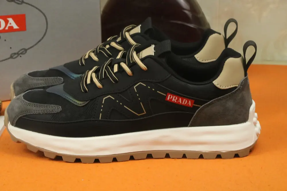 Prada Italian men’s shoes are featured on the cover of the quarterly fashion magazine