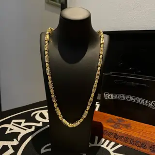 Chrome Hearts gold and white diamond necklace