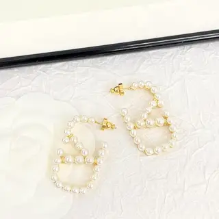 Valentino 3D hollow V letter pearl earrings