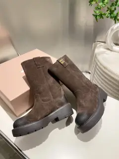 Miumiu boots are wide