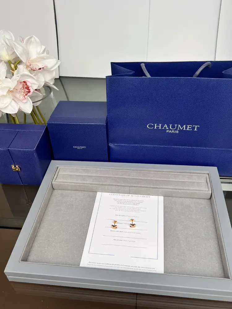 Chaumet cross-over diamond earrings