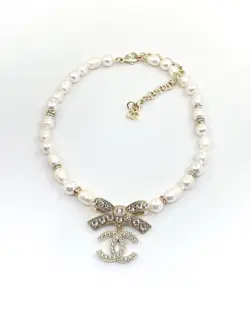 Chanel light gold bow shaped pearl necklace