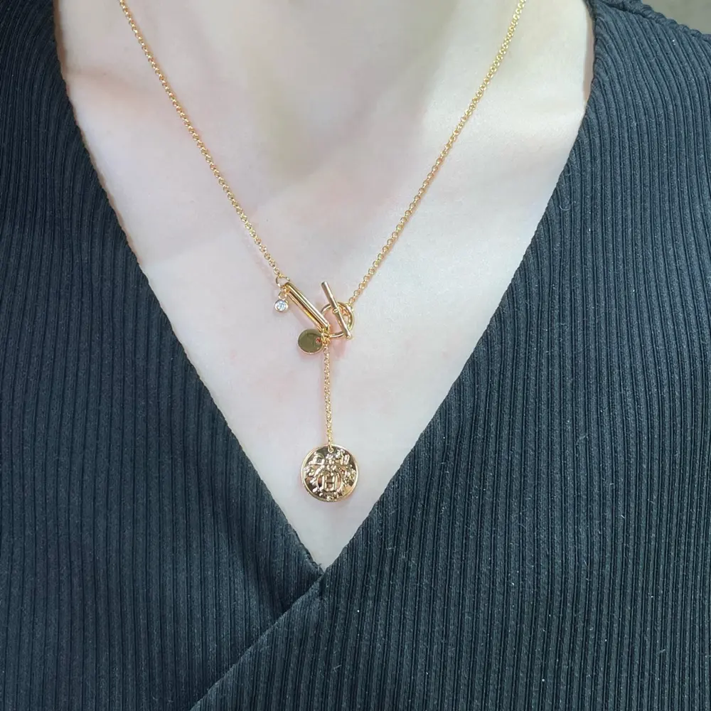 V gold material Hermès coin necklace