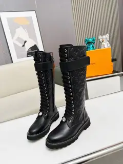 Louis Vuitton flat high boots in calfskin with adjustable Velcro laces and rubber Vuitton