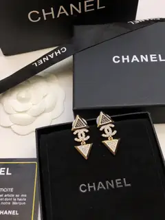Chanel triangle earrings