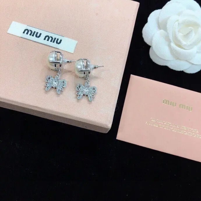 Miumiu Paris fashion show’s latest bow earrings