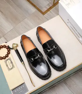 Gucci metal buckle loafers