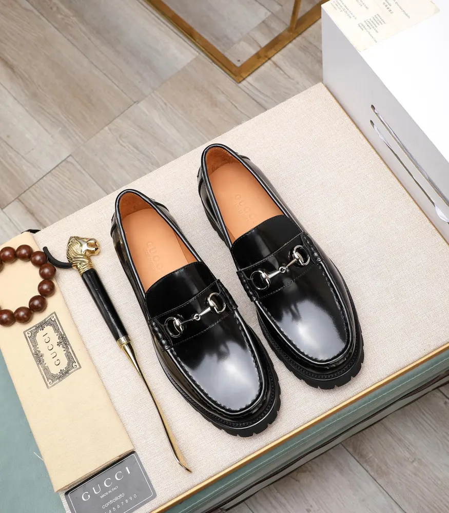 Gucci metal buckle loafers