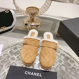 Chanel’s popular all-leather slippers