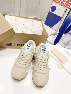 Miu Miu Miu x New Balance 574 co-branded NB sneakers