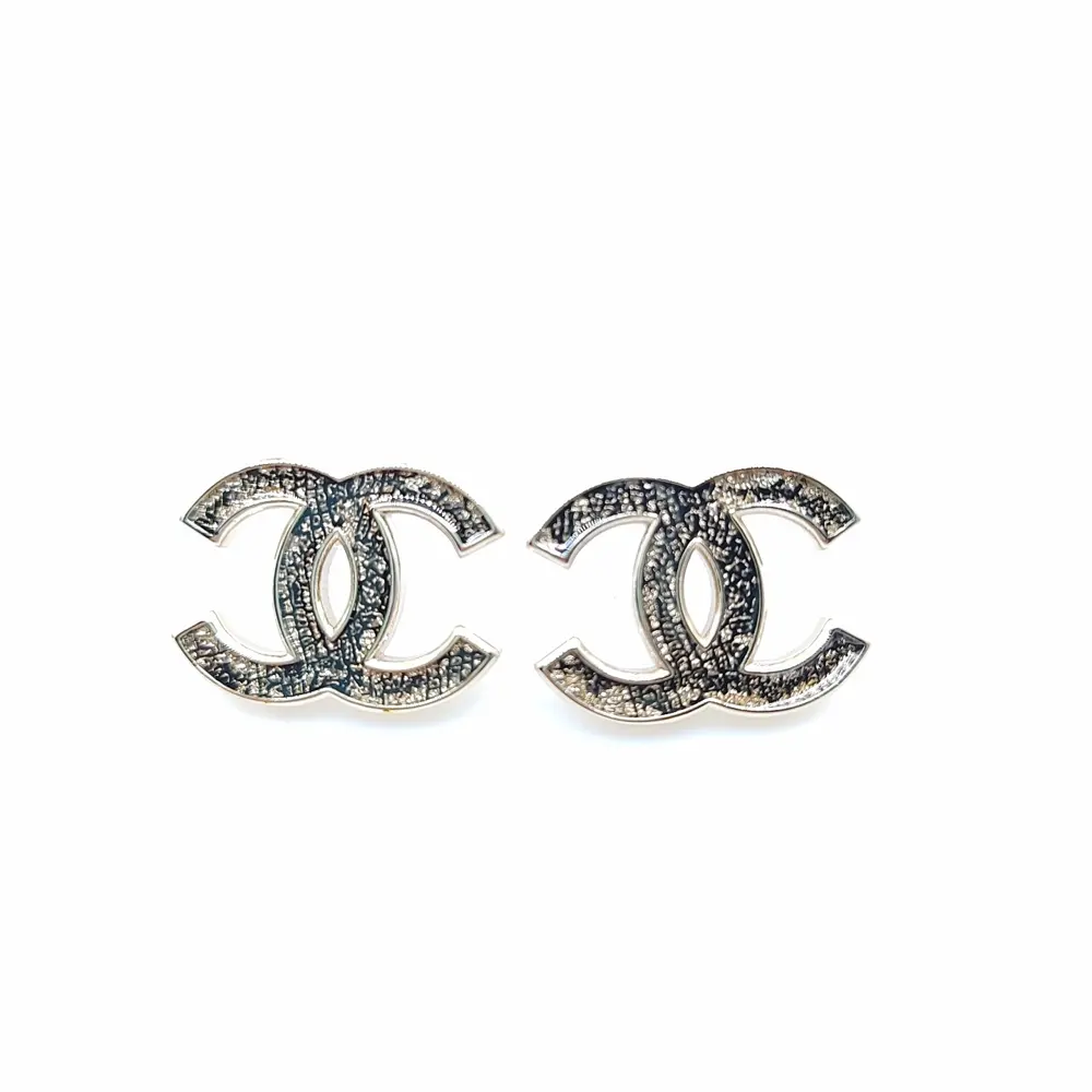 Chanel light gold cc earrings