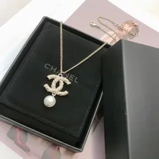 Chanel Double C pearl necklace with twisted inlaid millet beads