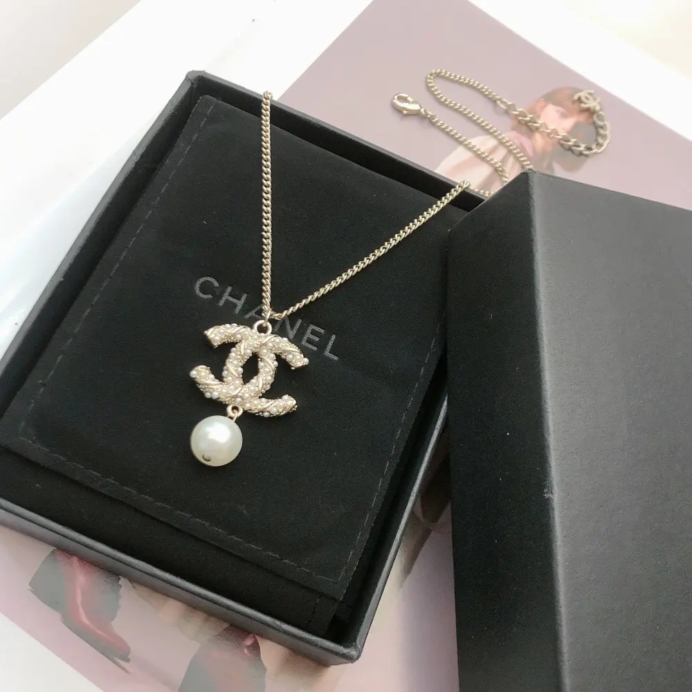 Chanel Double C pearl necklace with twisted inlaid millet beads