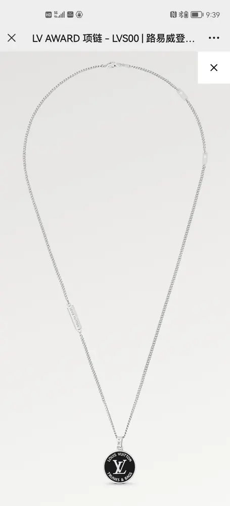 Louis Vuitton enamel medallion hanging from a thin chain necklace