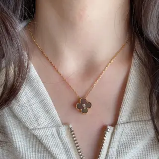 Van Cleef & Arpels natural grey shell with diamond backing and four-leaf clover necklace