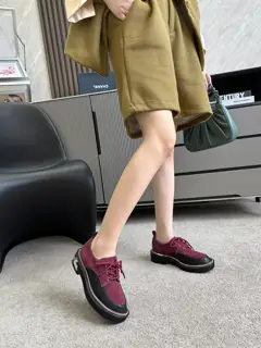 Chanel leather shoes with gold hardware buckle and chain