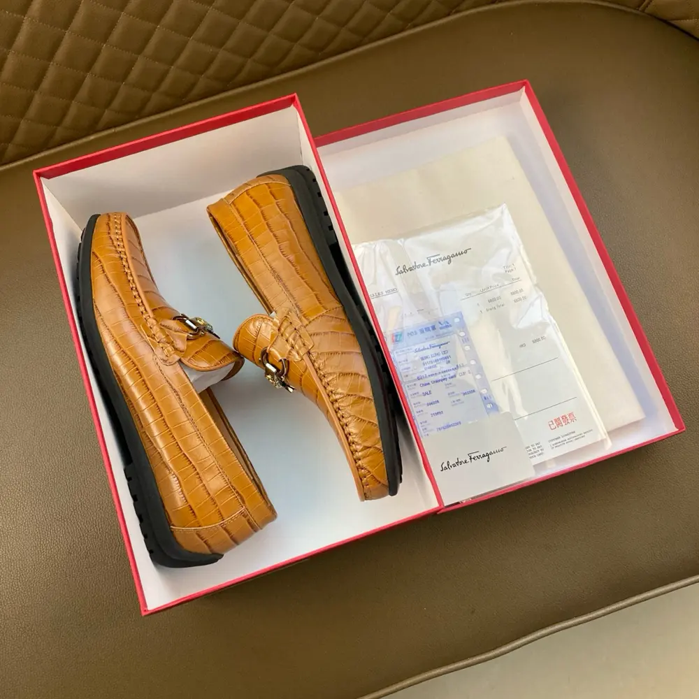 Salvatore Ferragamo’s loafers are legendary in Hong Kong. The of frosted leather is matched