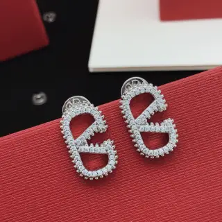 Valentino V-shaped diamond-encrusted silver earrings