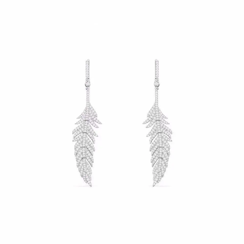 Apm monaco light feather crystal earrings